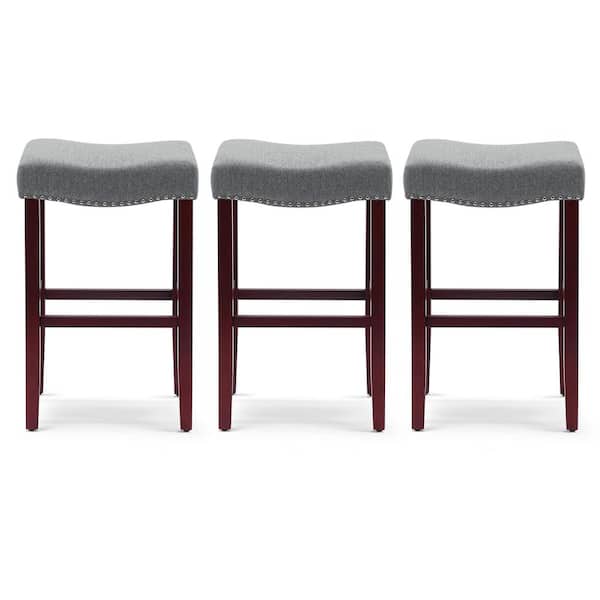 WESTINFURNITURE Jameson 29 in. Bar Height Cherry Wood Finish Backless Nail Head Trim Barstool with Gray Linen Saddle Seat (Set of 3)