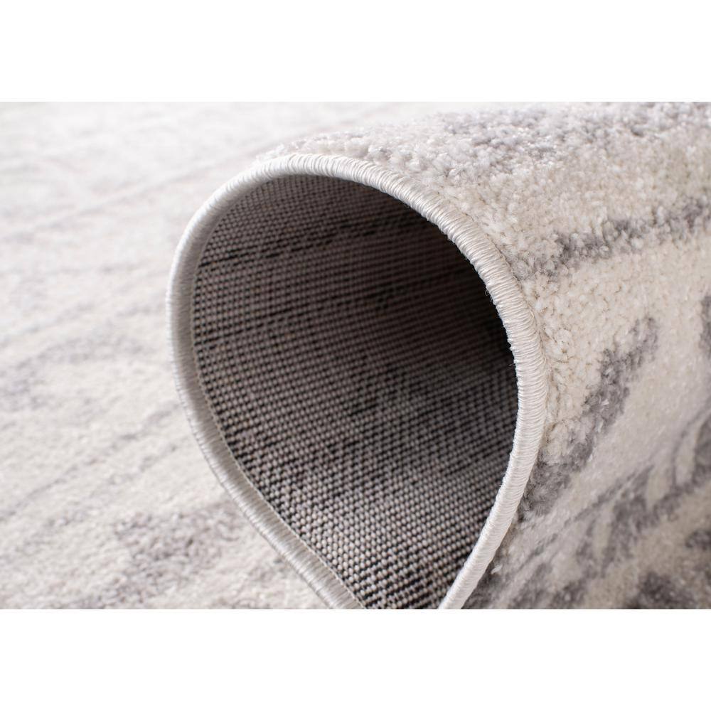 Ivory and Grey 6' x 9' Synthetic Reversible Area Rug