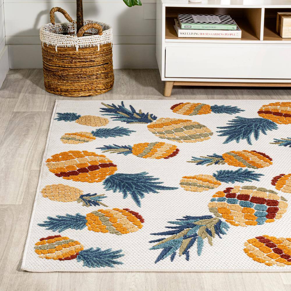4' x 6' Ivory and Orange Floral Synthetic Area Rug