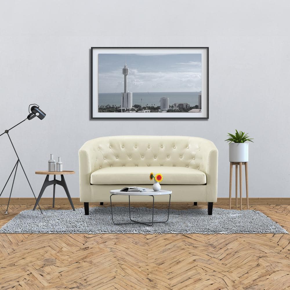 Cream Tufted Faux Leather Loveseat with Wooden Legs