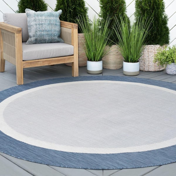 Eco Solid Border Blue 6 ft. Round Indoor/Outdoor Area Rug