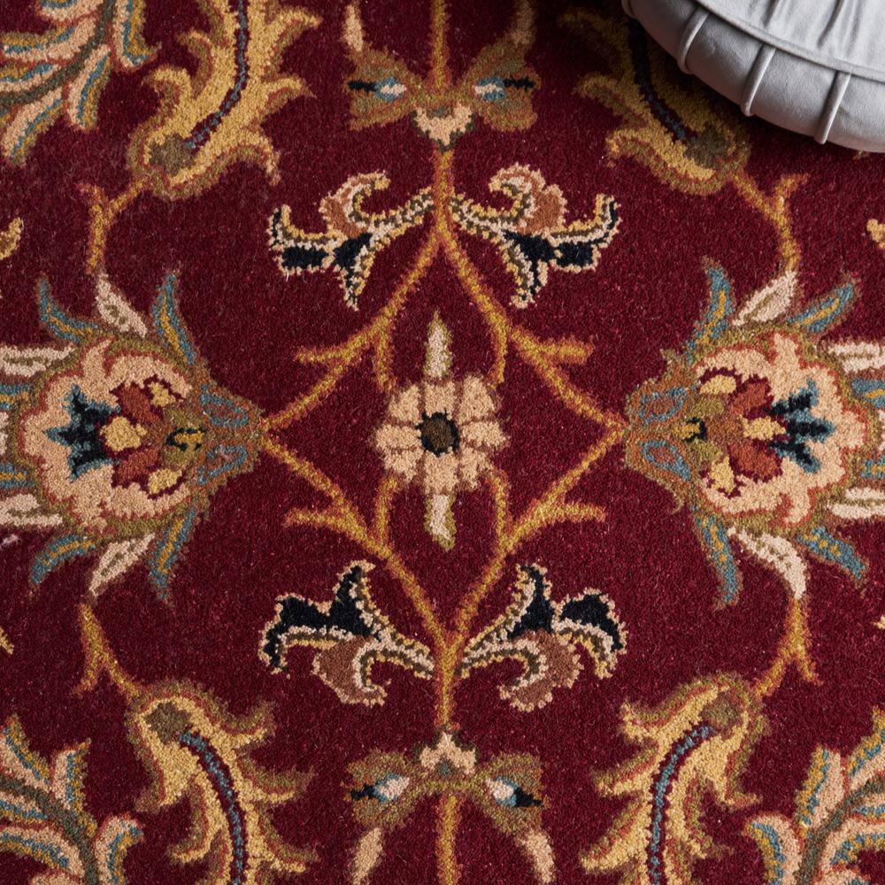 Hand-Tufted Red and Ivory Wool Oval Area Rug 8' x 10'