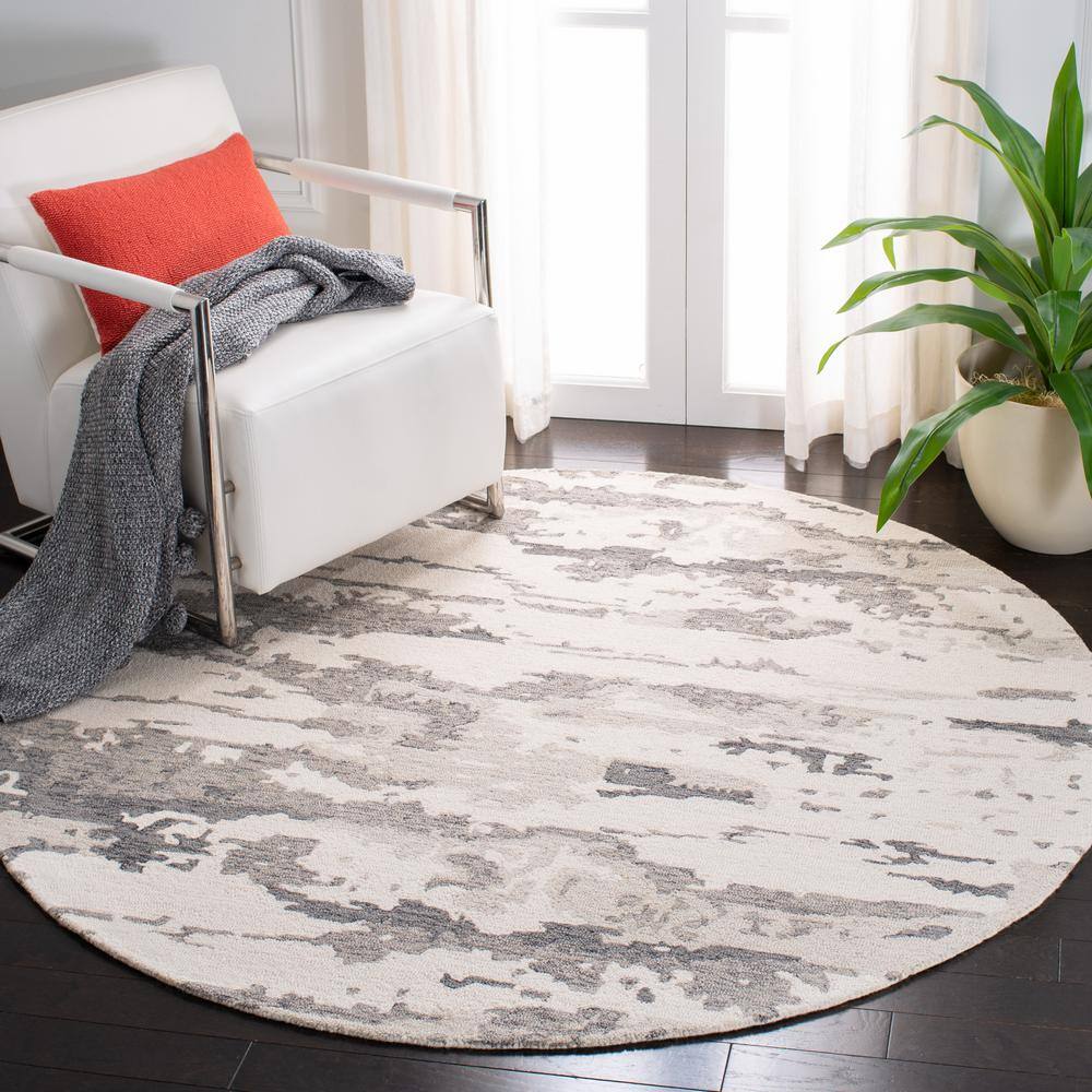 Handmade Tufted Charcoal/Ivory Round Wool Area Rug
