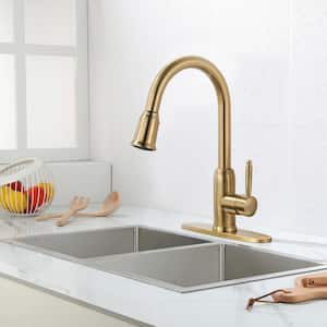 Single Handle Deck Mount Gooseneck Pull Down Sprayer Kitchen Faucet with Deckplate Included in Brushed Gold