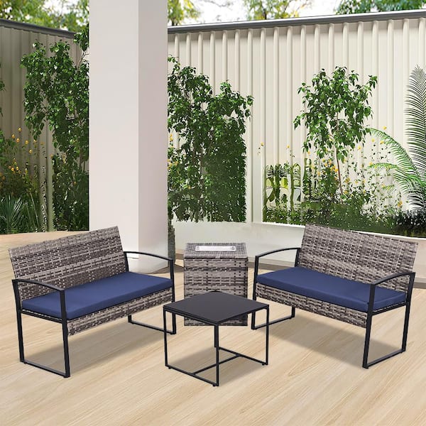 4-Piece Gray Wicker Patio Conversation Set with Blue Cushions and 1 Coffee table
