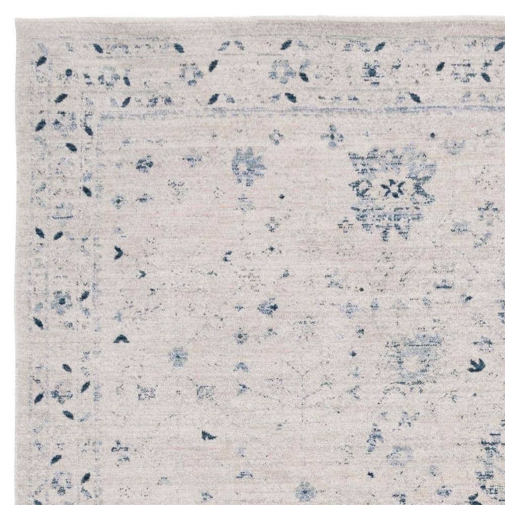 Ivory and Blue Distressed Polyester Area Rug 9' x 11'6"