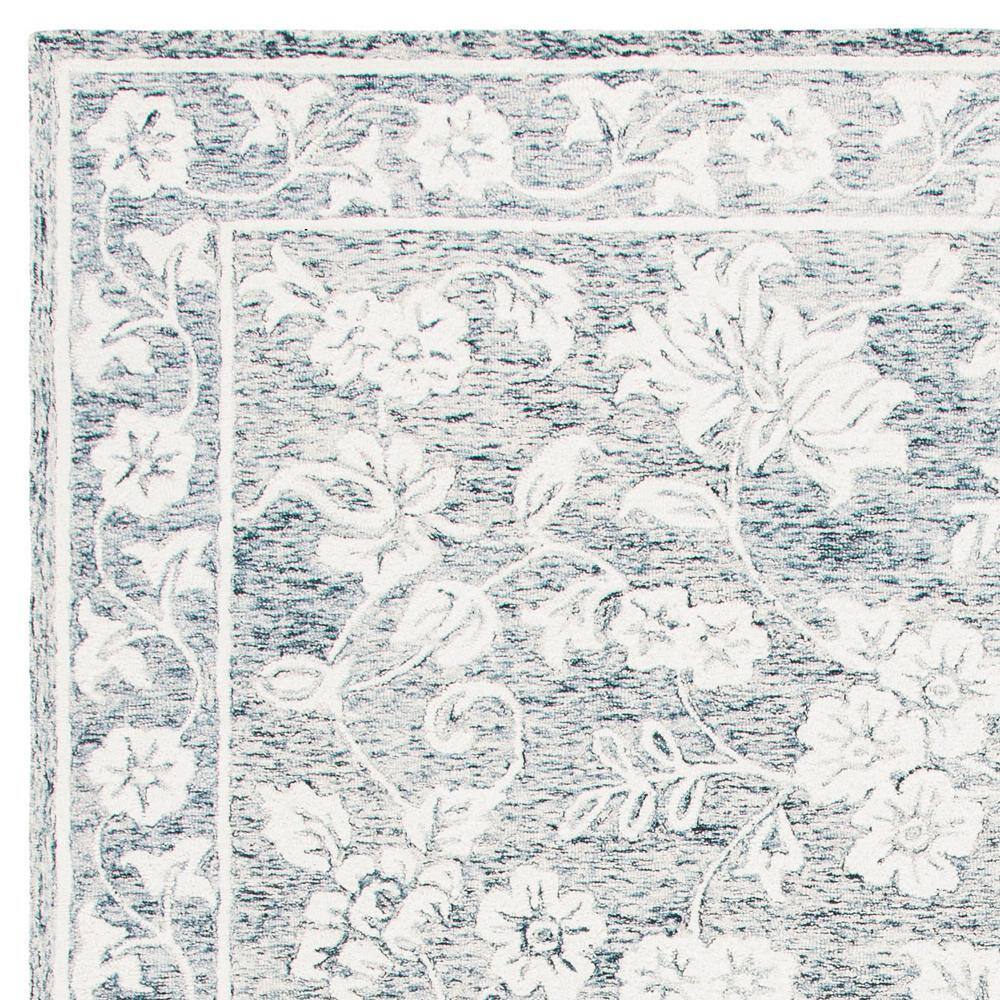 Capri Blue and Ivory Hand-Tufted Wool 8' x 10' Area Rug