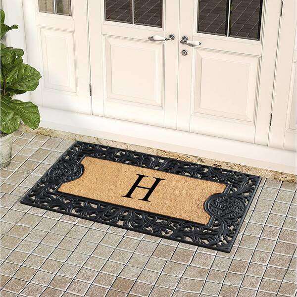 https://images.thdstatic.com/productImages/190182d2-9b41-44f4-9ac0-1687f45709d8/svn/black-a1-home-collections-door-mats-a1home200031-h-e1_600.jpg