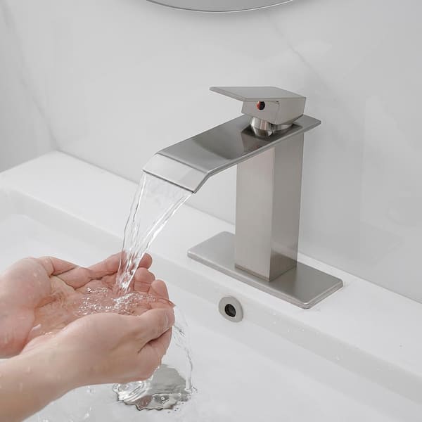 Waterfall Single Hole Single-Handle Low-Arc Bathroom Faucet With Pop-up Drain Assembly in Brushed Nickel