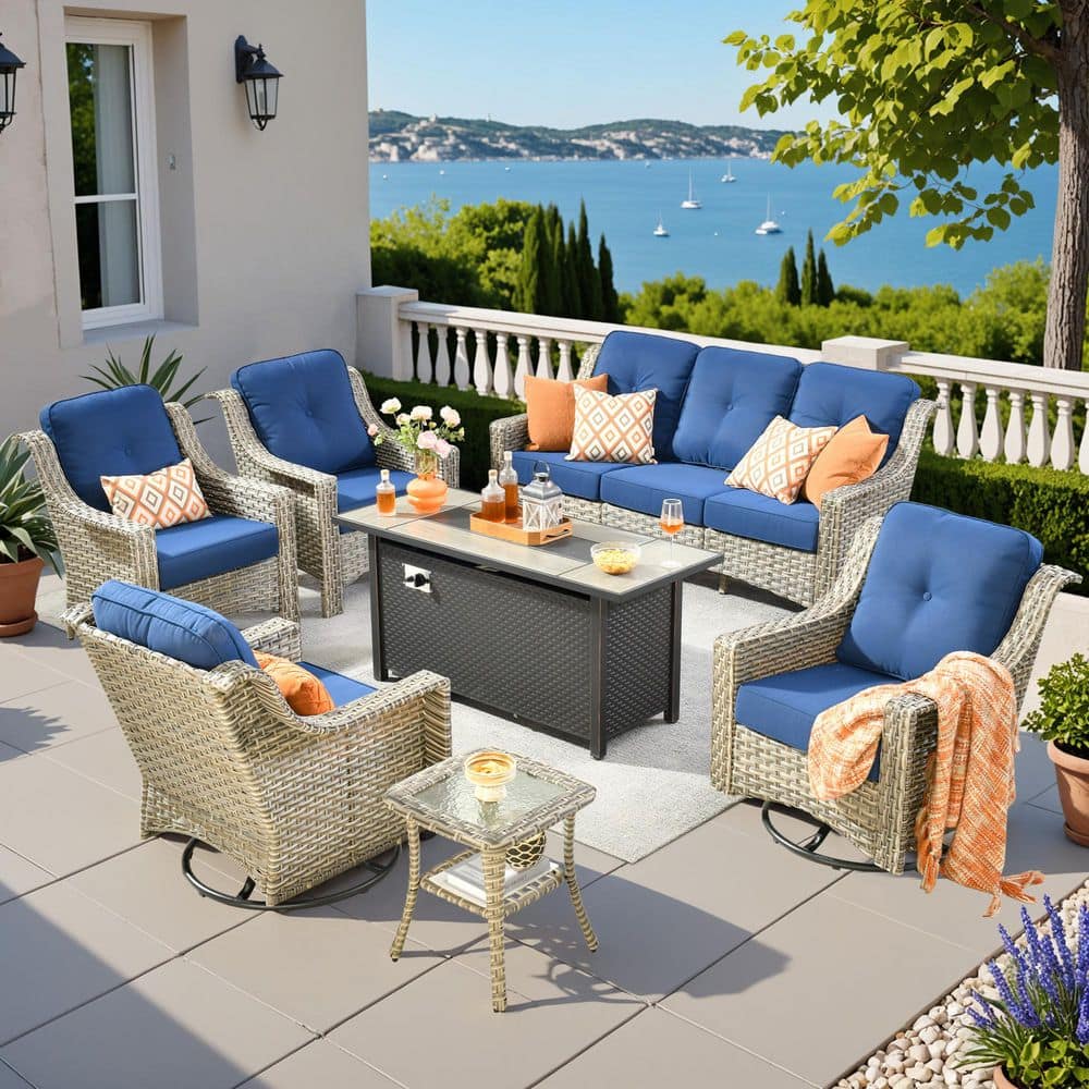 Eureka 7-Piece Wicker Patio Conversation Sofa Swivel Chair Set with Metal Fire Pit Table and Navy Blue Cushions