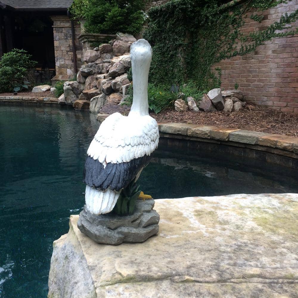 Natural Finish Pelican Statue on Coastal Rock for Indoor/Outdoor Decor