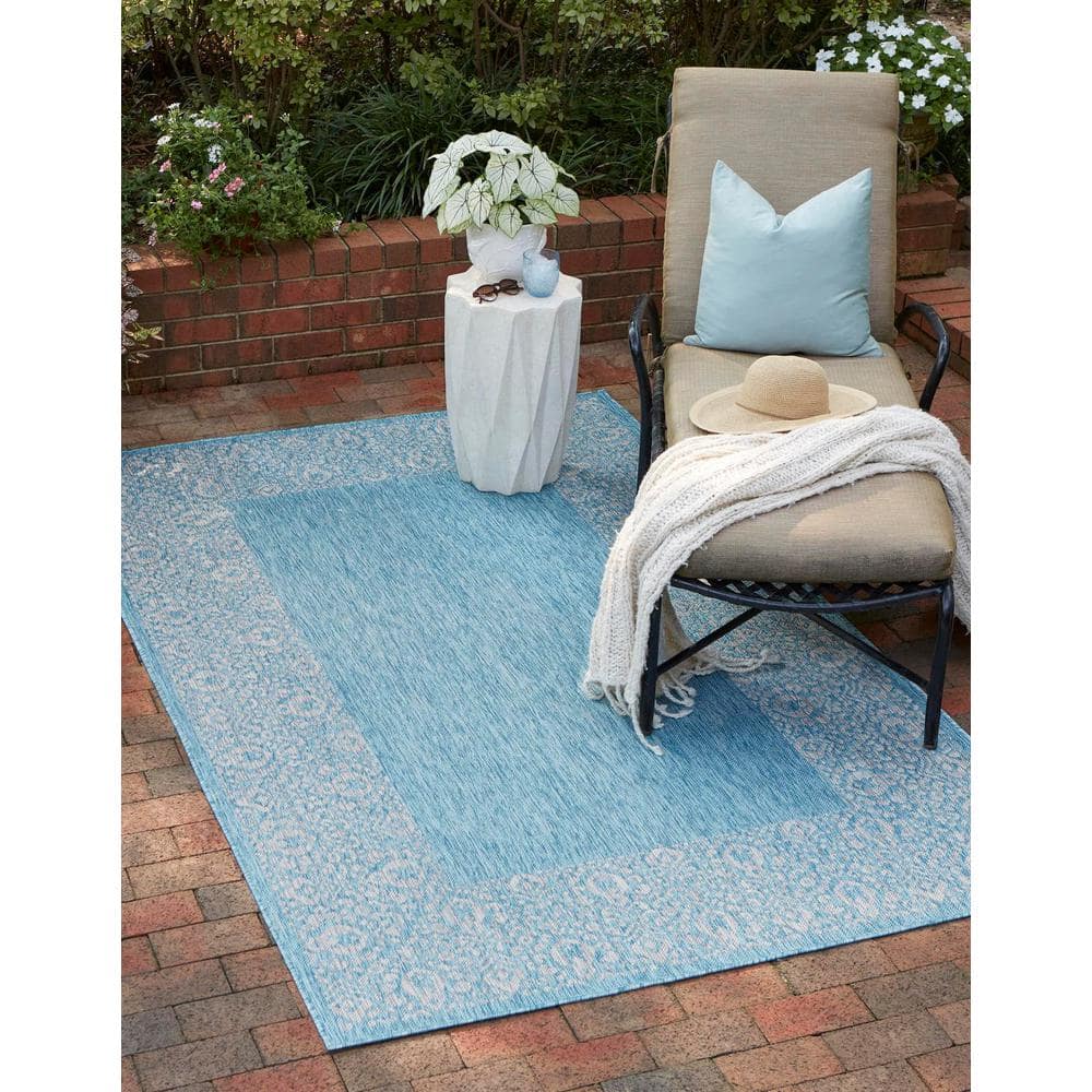 Aqua Floral Bliss Easy-Care Synthetic Outdoor Rug 7'1" x 10'