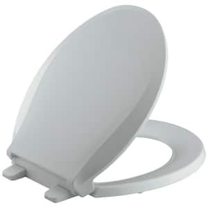 Cachet Quiet-Close Round Front Closed-Front Toilet Seat with Grip-Tight Bumpers in Ice Grey