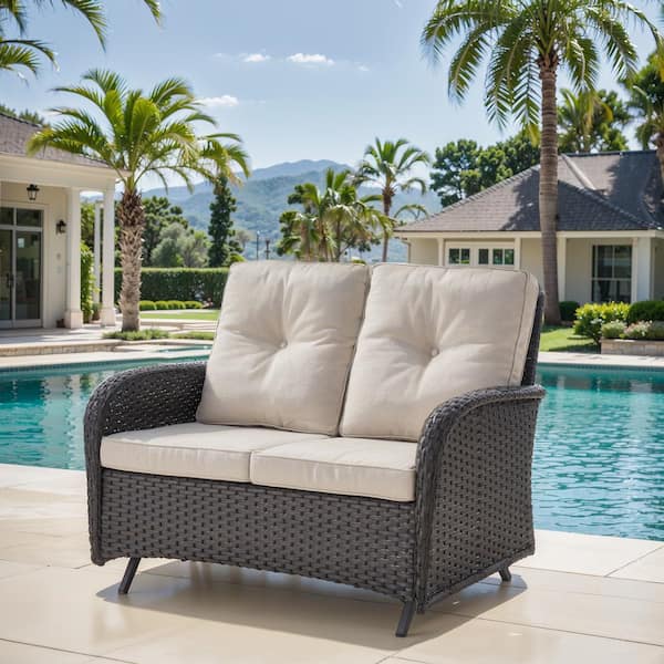 Black PE Wicker Outdoor Loveseat with Beige Cushions and Glide Function
