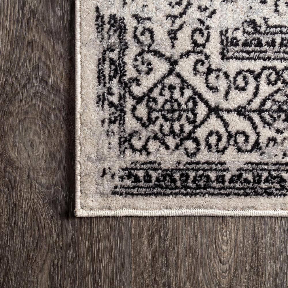 Black and White Filigree 4' x 6' Synthetic Area Rug
