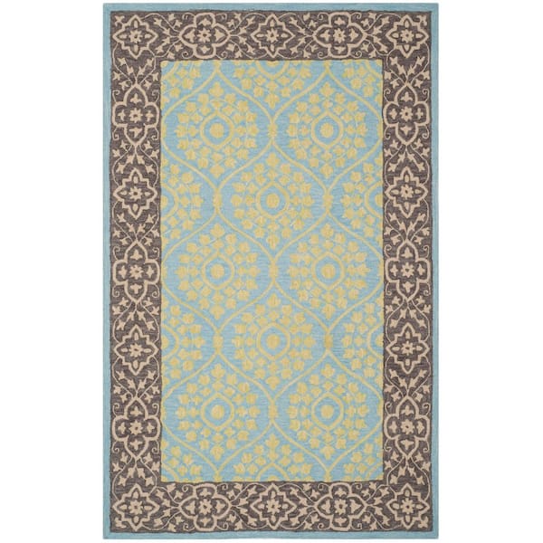 Suzani 5 ft. x 8 ft. Chocolate/Yellow Trellis Ornate Border Area Rug