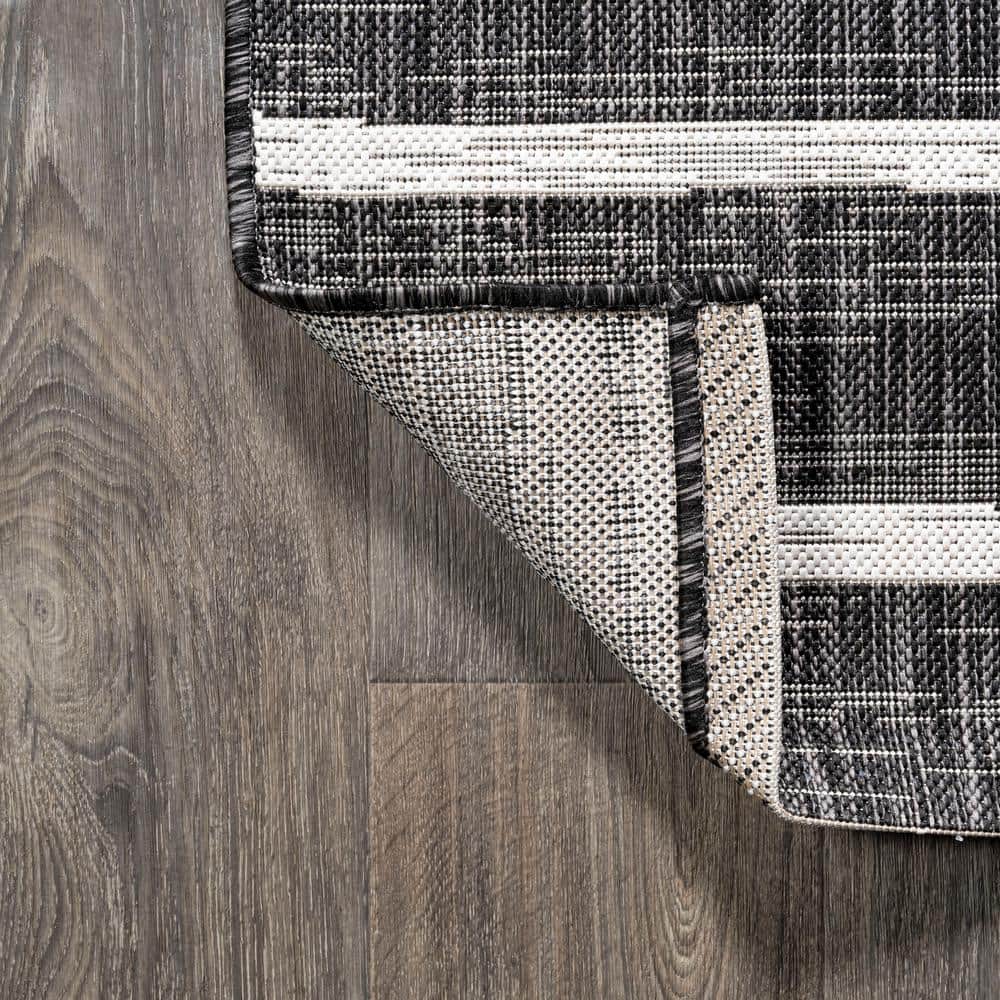 3' x 5' Black and Ivory Synthetic Stripe Rectangular Rug