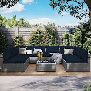 Gray 9-Piece Wicker Patio Conversation Set with Dark Blue Cushions and Coffee Table
