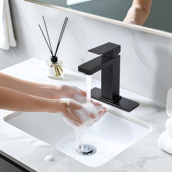 Single Handle Single Hole Bathroom Faucet with Deckplate and Pop Up Drain Included in Oil Rubbed Bronze