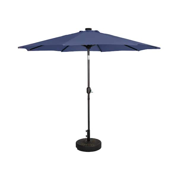 WESTIN OUTDOOR Marina Navy Blue 9 ft. Market Solar Powered LED Lighted Tilt Patio Umbrella with Bronze Round Base Included