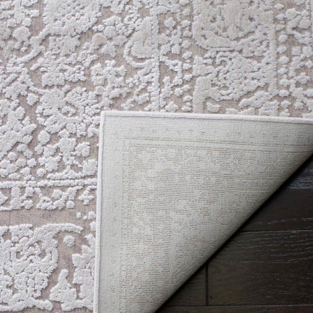 Beige and Cream Floral Synthetic Area Rug 8' x 10'