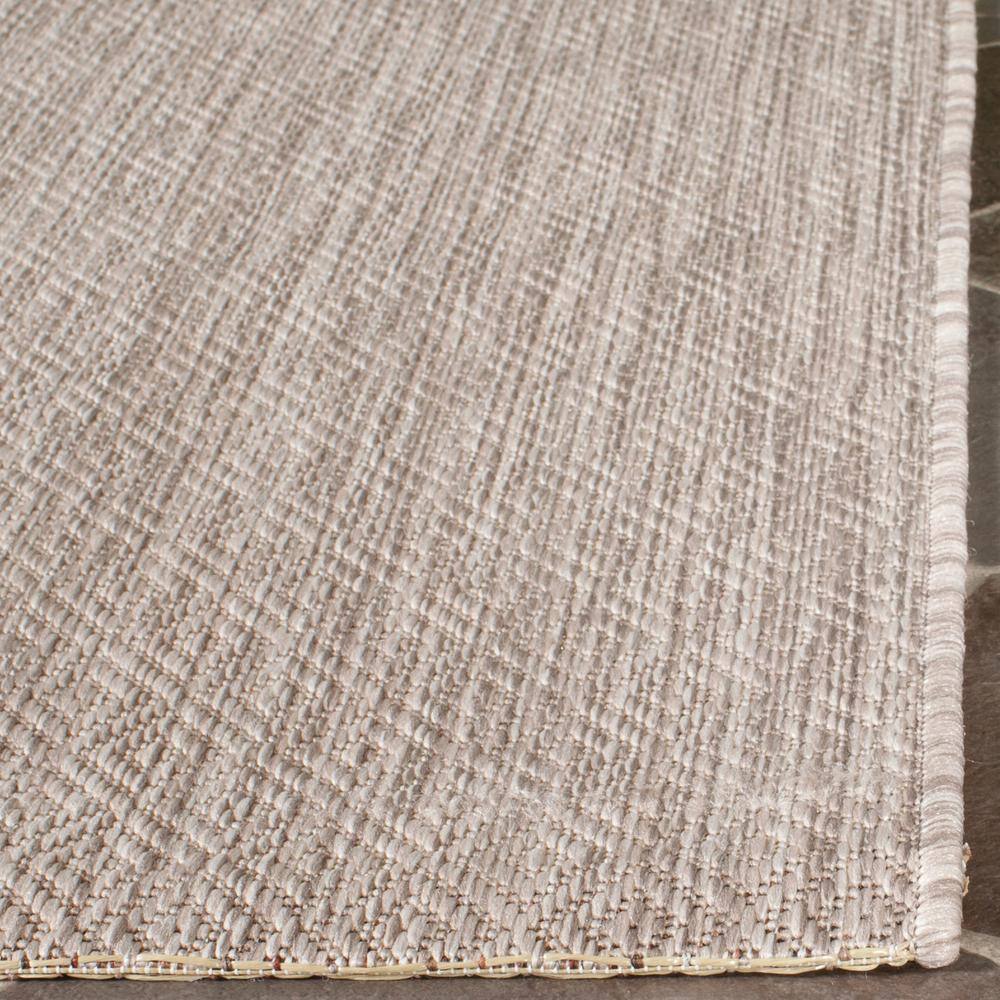 Beige Courtyard 59" Easy-Care Synthetic Indoor/Outdoor Area Rug
