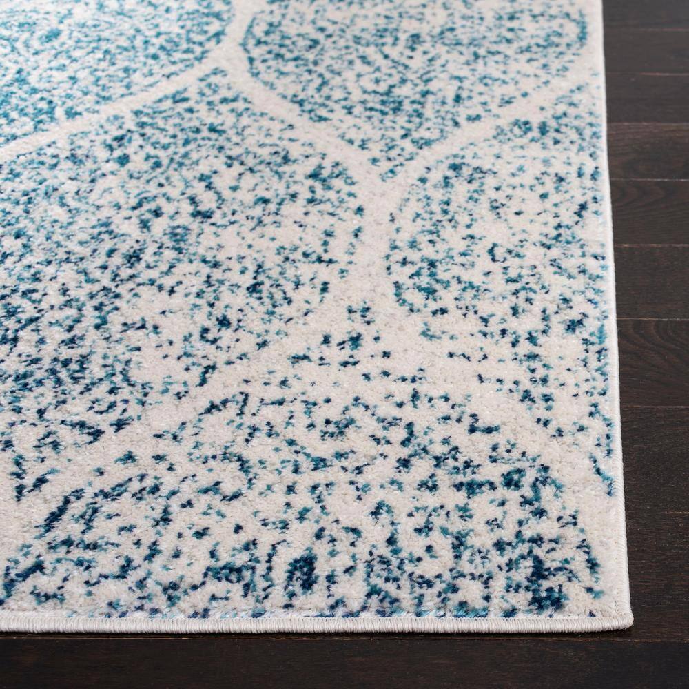 Chic Metro-Mod Cream & Turquoise 3' x 5' Synthetic Area Rug