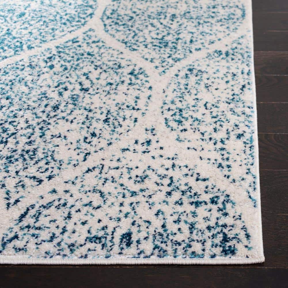 Blue 9' x 12' Reversible Stain-Resistant Synthetic Area Rug