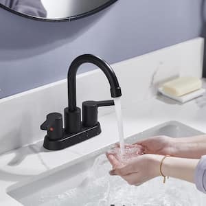 4 in. Centerset Double Handle Mid Arc Bathroom Faucet with Drain Kit Included in Matte Black