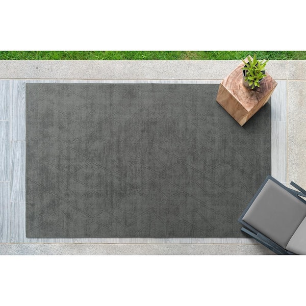 https://images.thdstatic.com/productImages/1a06bc81-fa2e-4ee5-b1f3-d9a8a1fb1c76/svn/charcoal-kaleen-outdoor-rugs-mkh04-38-769-31_600.jpg
