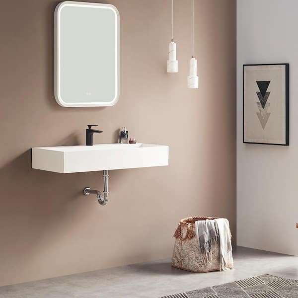 https://images.thdstatic.com/productImages/1a07a833-89b7-48bd-8522-f14082117f10/svn/matte-white-wall-mount-sinks-svws605-40wh-1d_600.jpg