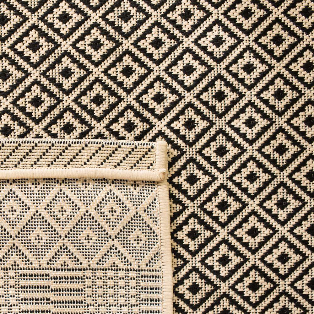 Beige and Black Rectangular Synthetic Indoor/Outdoor Area Rug