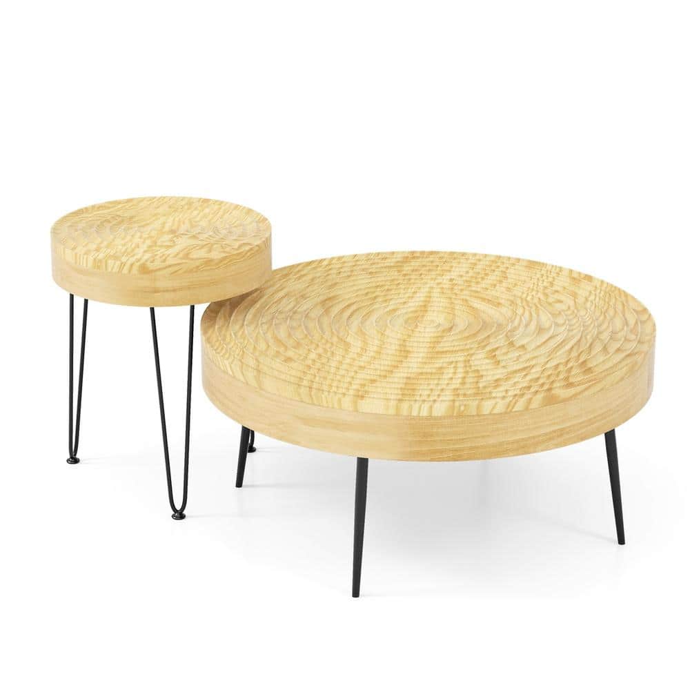 Set of two round natural wood coffee tables with black hairpin legs.
