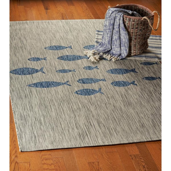 https://images.thdstatic.com/productImages/1a1d7a75-1a62-4884-bc13-0fdda06e4413/svn/gray-blue-lr-home-outdoor-rugs-7183a7084d9348-fa_600.jpg