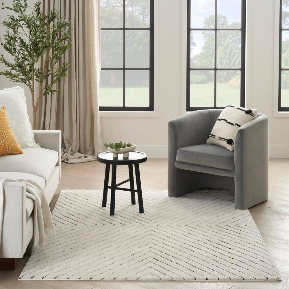 Ivory Black Abstract 8' x 10' Synthetic Area Rug