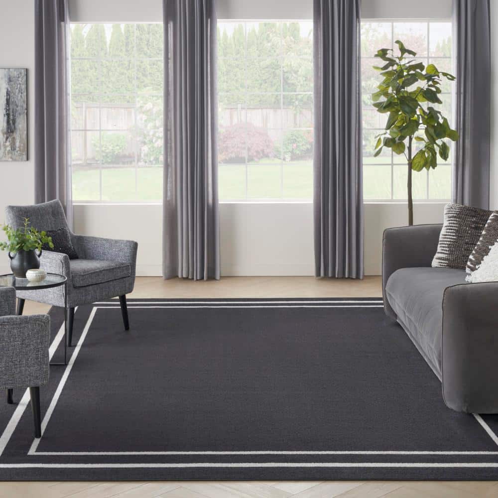 Reversible Black Ivory Synthetic 9' x 12' Area Rug