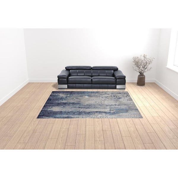 9 ft. x 12 ft. Ivory and Blue Abstract Area Rug