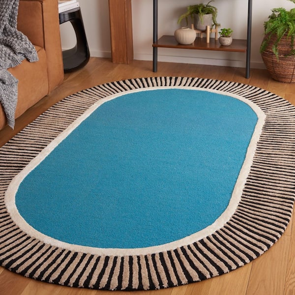 Fifth Avenue 3 ft. x 5 ft. Blue/Black Striped Border Solid Oval Area Rug