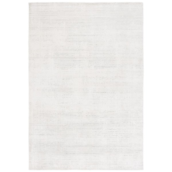 Mirage 6 ft. x 9 ft. Ivory Faded Abstract Area Rug