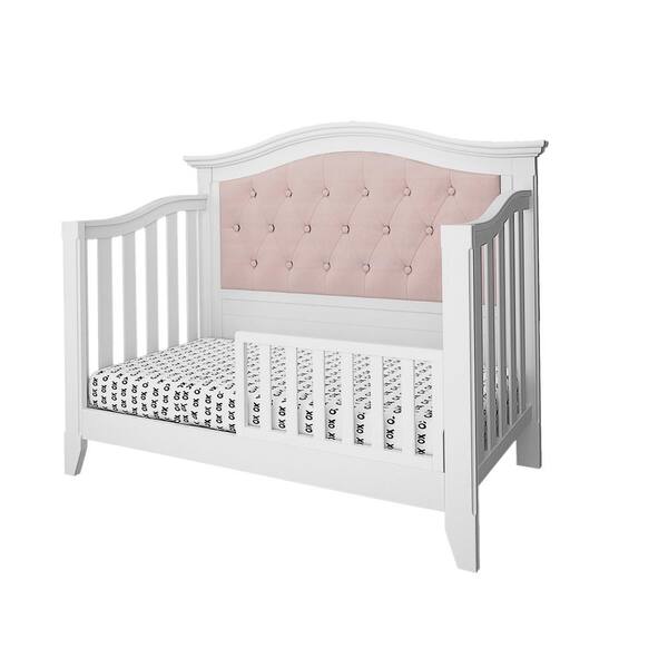 pink tufted crib