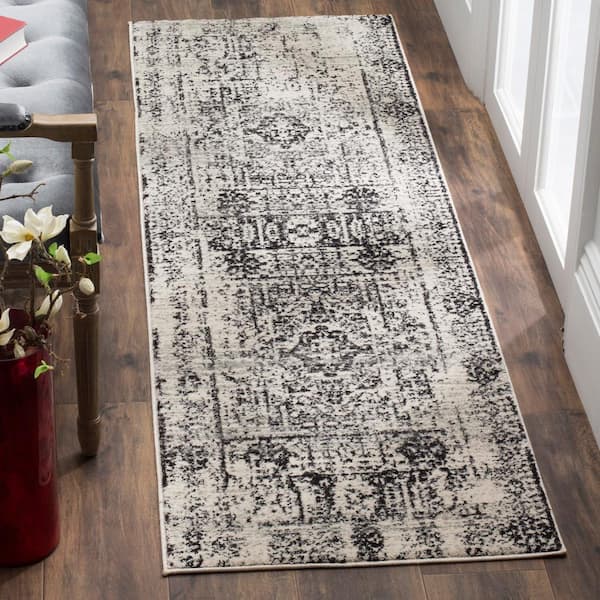 Evoke Ivory/Black 2 ft. x 8 ft. Distressed Medallion Runner Rug