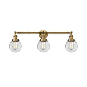 Beacon 30 in. 3-Light Brushed Brass Vanity Light with Clear Glass Shade