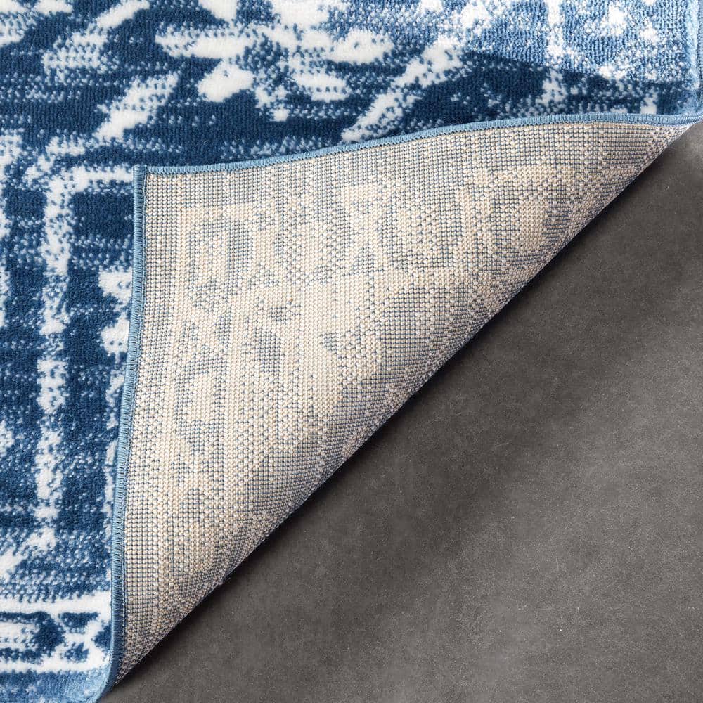 Light Blue Floral Synthetic Reversible 5' x 7' Rug