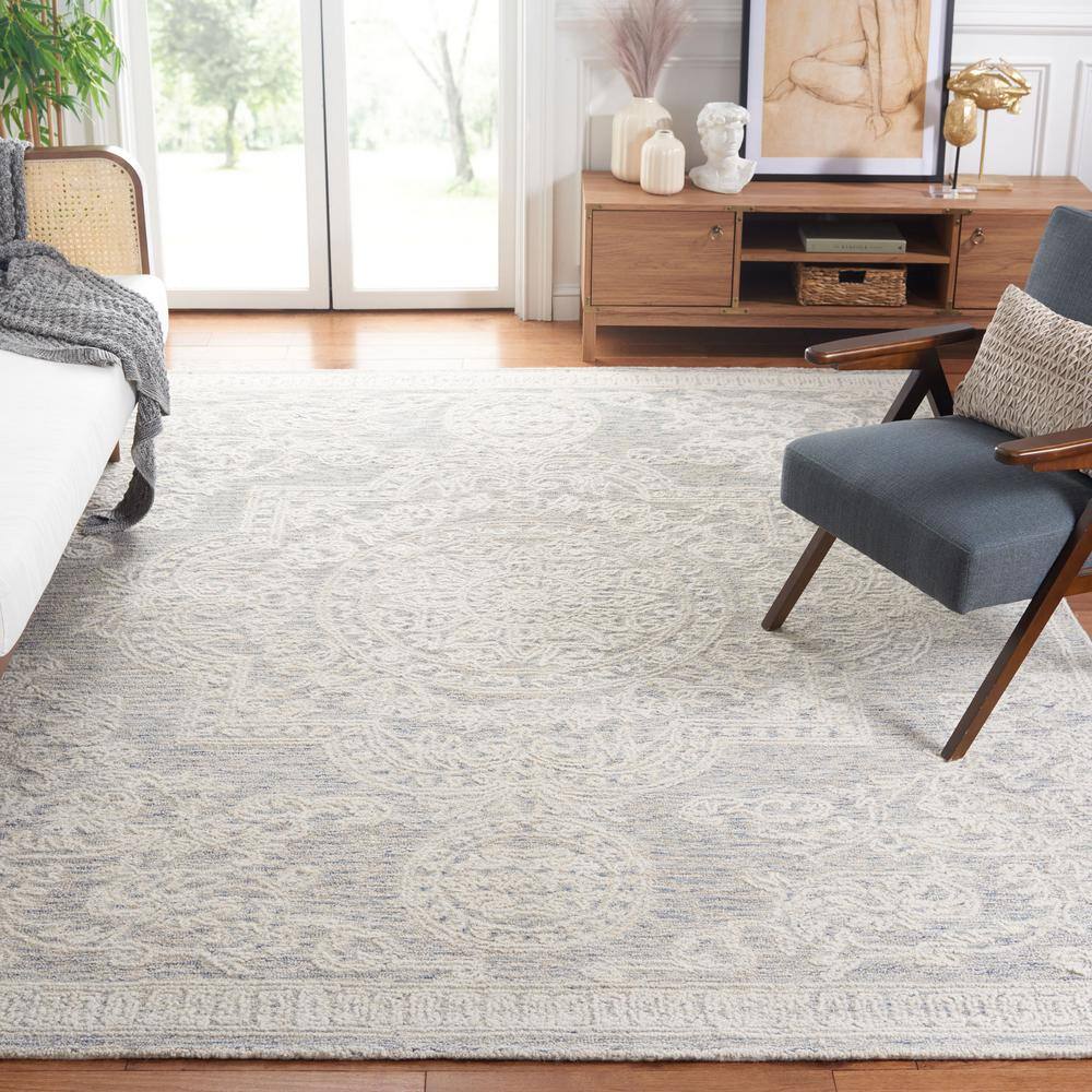 Ivory and Blue Handmade Wool Abstract Tufted Area Rug, 8' x 10'