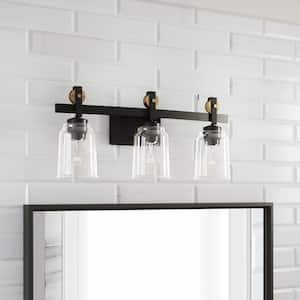 Knollwood 3-Light Antique Bronze Vanity Light with Vintage Brass Accents and Clear Glass Shades