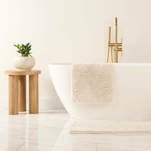 Becky Cameron Ultra Soft 24 in. x 17 in. Ivory Plush Bath Mat LLP