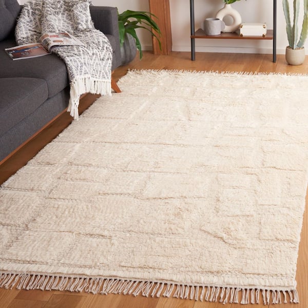 Kenya 6 ft. x 9 ft. Ivory High-Low Solid Fringe Area Rug