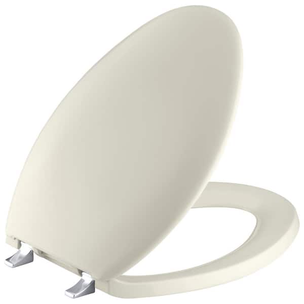 KOHLER Bancroft Elongated Closed-front Toilet Seat with Polished Chrome Hinge in Biscuit