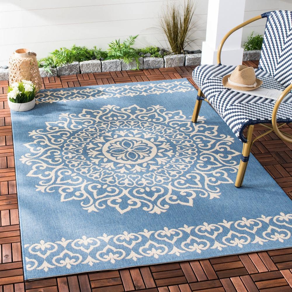 Cream and Blue Medallion Synthetic 8' x 10' Reversible Area Rug