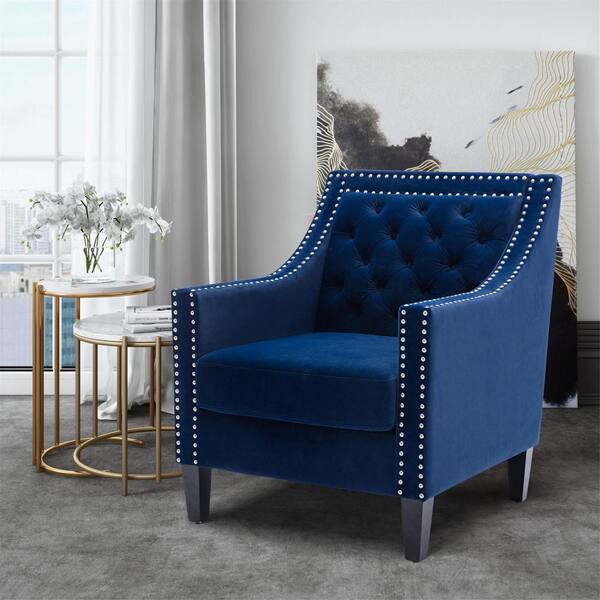 blue studded armchair